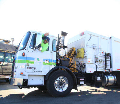 A collection crew working a commercial route